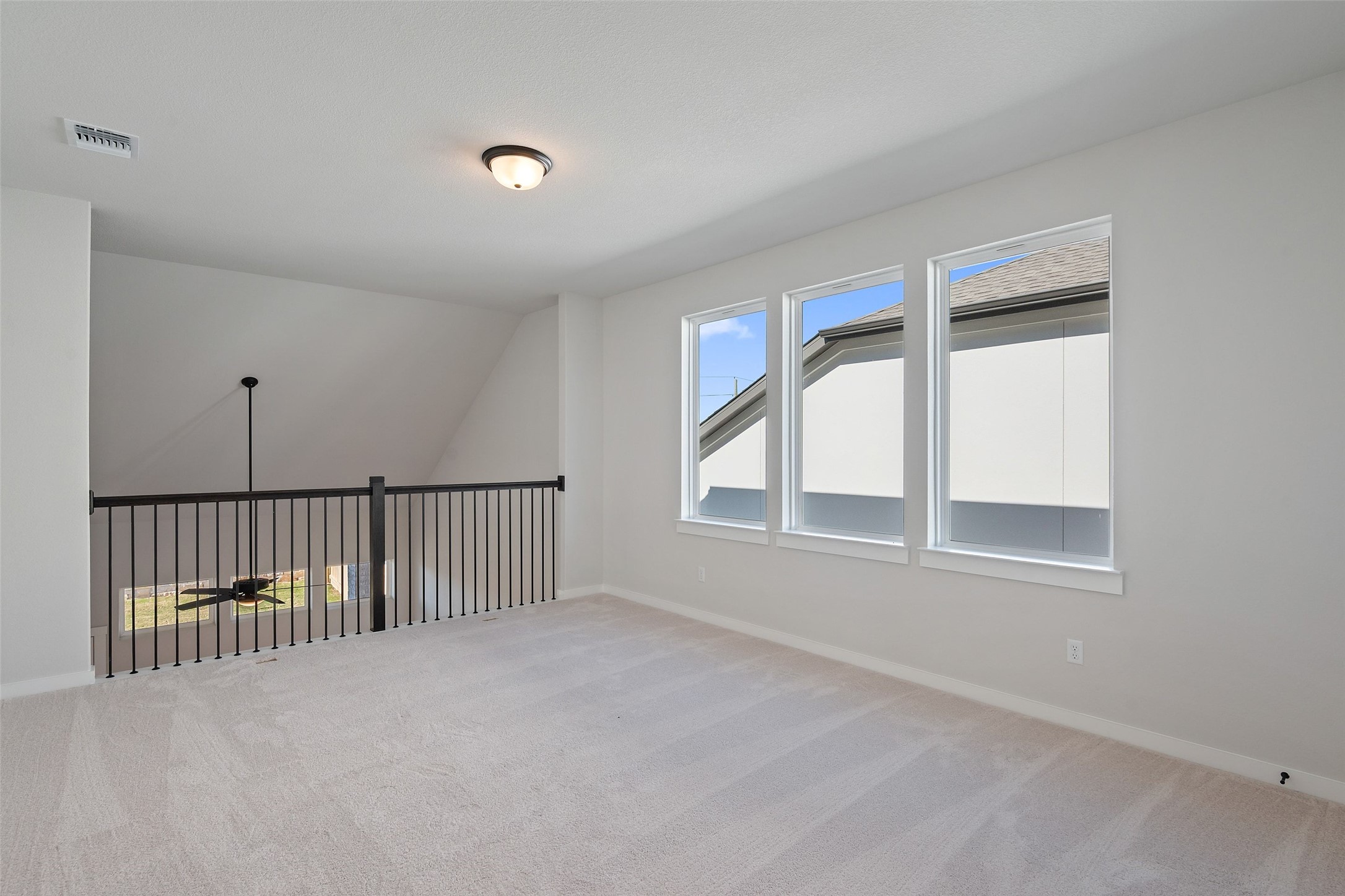 228 Brandywine Road Hutto, TX 78634 - Photo 37 of 40 a view of an empty room with a window