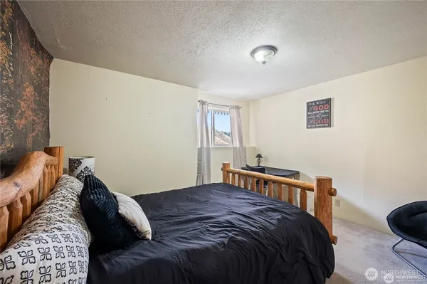 a bathroom with a sink toilet and a mirror