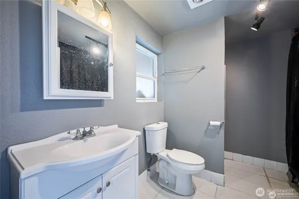 a view of a swimming pool with an outdoor space and seating area