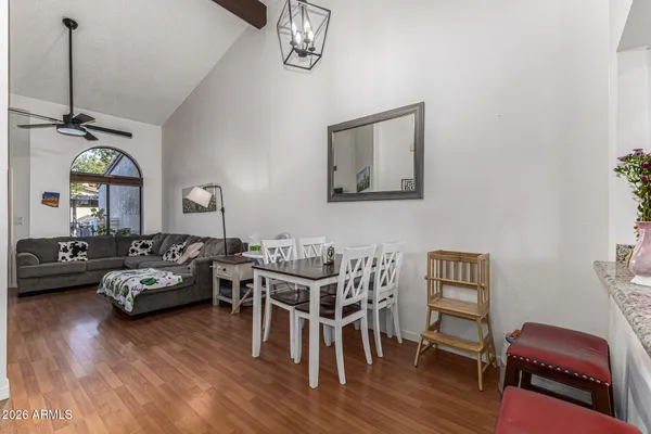 a kitchen with a sink appliances and cabinets
