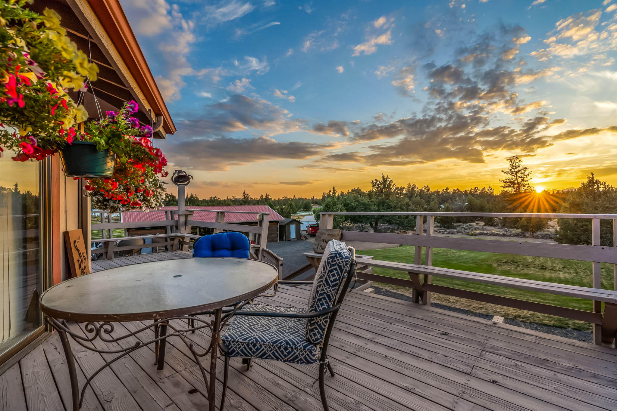 61785 Ten Barr Ranch Road Bend, OR 97701 - Photo 11 of 53 Deck at sunset