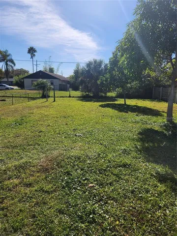 a view of a golf course with a lake