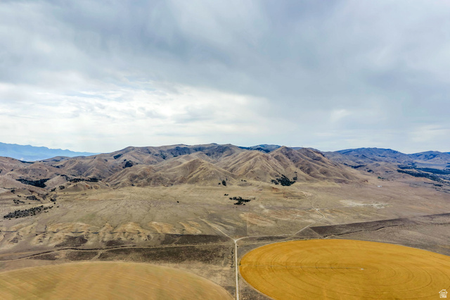 12800 South Crooked Cyn Road South Elberta, UT 84626 - Photo 42 of 48 Expansive agricultural land featuring a central circular field and surrounding natural terrain