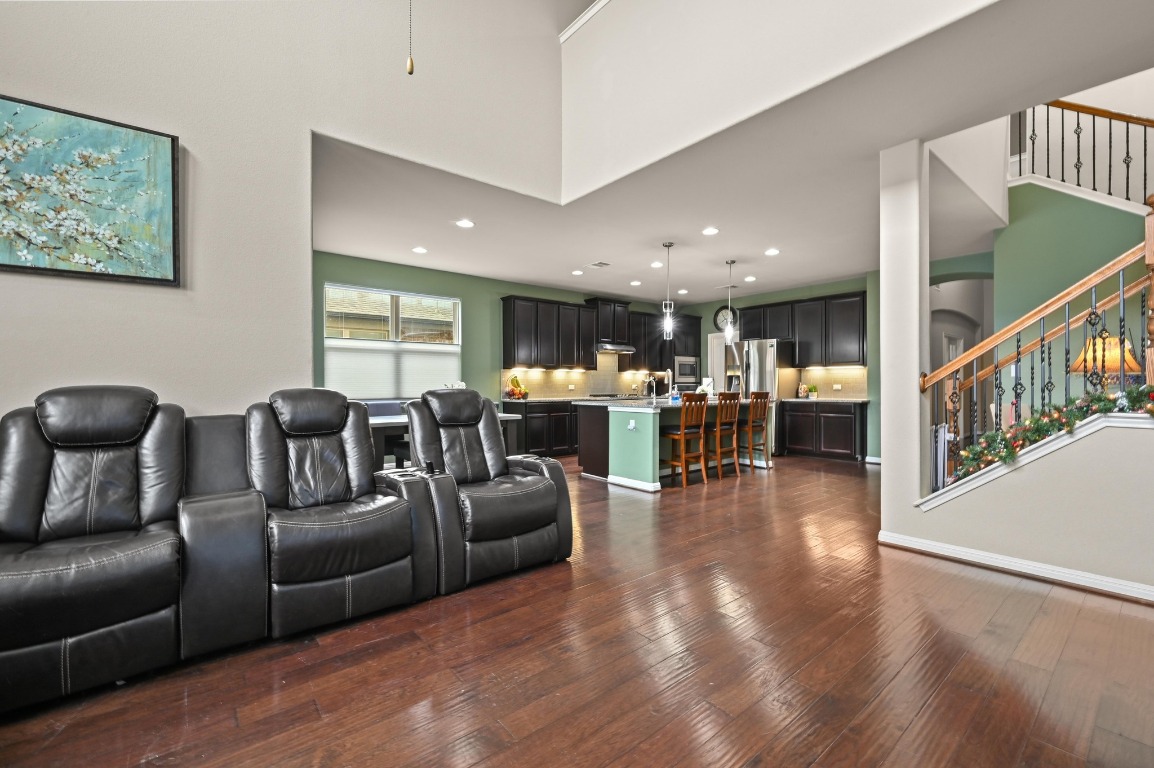 154 Pettigrew Path Buda, TX 78610 - Photo 14 of 36 a living room with furniture and a table