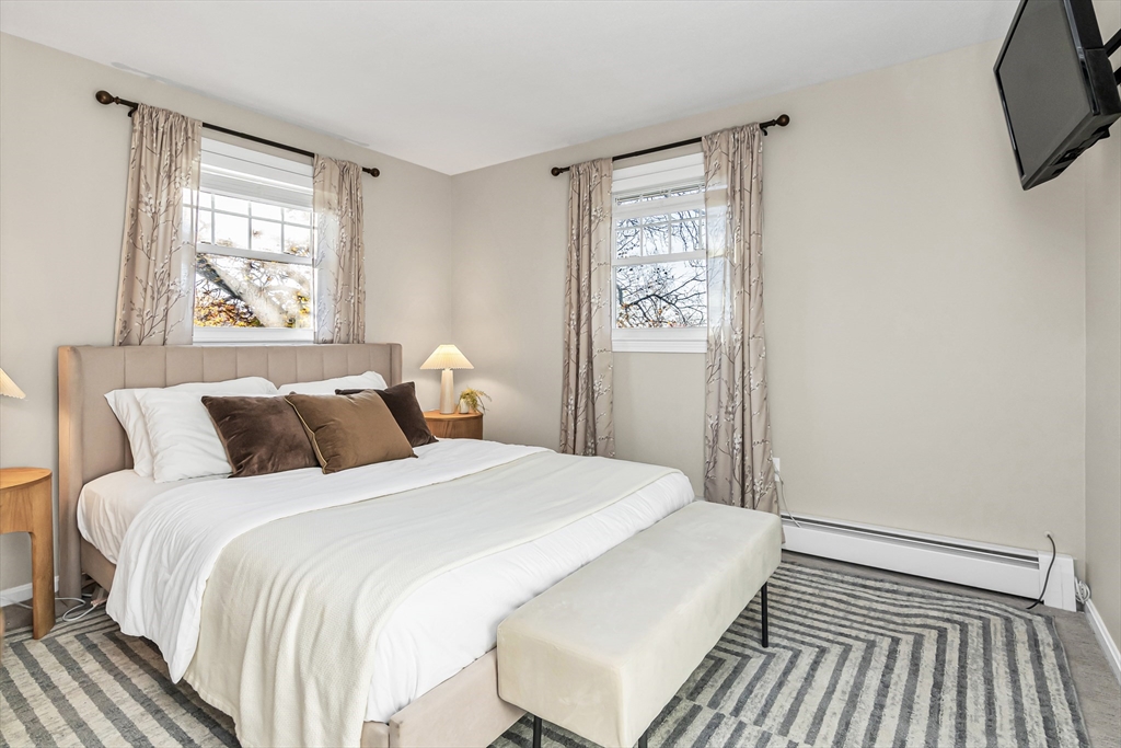 36 Summit Street Salem, MA 01970 - Photo 15 of 42 a bedroom with a bed and a window