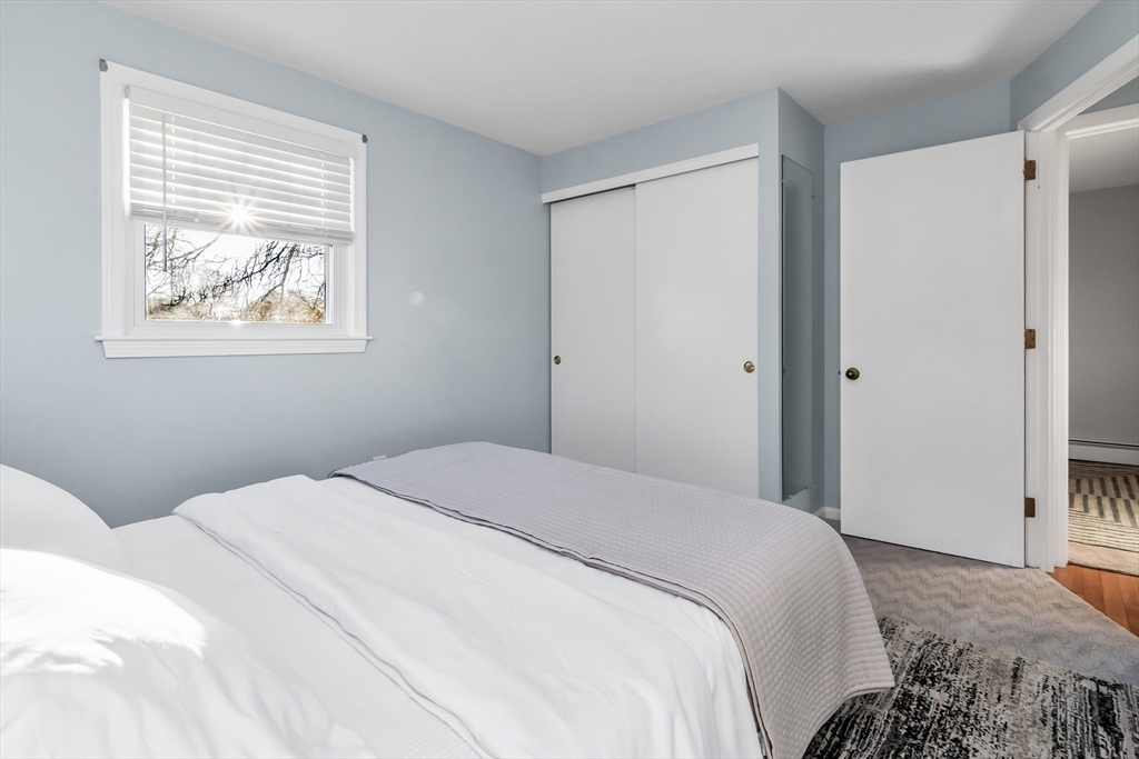 36 Summit Street Salem, MA 01970 - Photo 19 of 42 a bedroom with a bed and a window