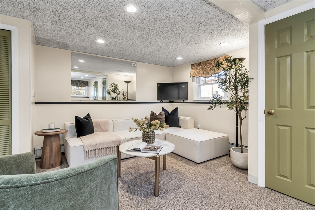 36 Summit Street Salem, MA 01970 - Photo 21 of 42 a living room with furniture and a couch