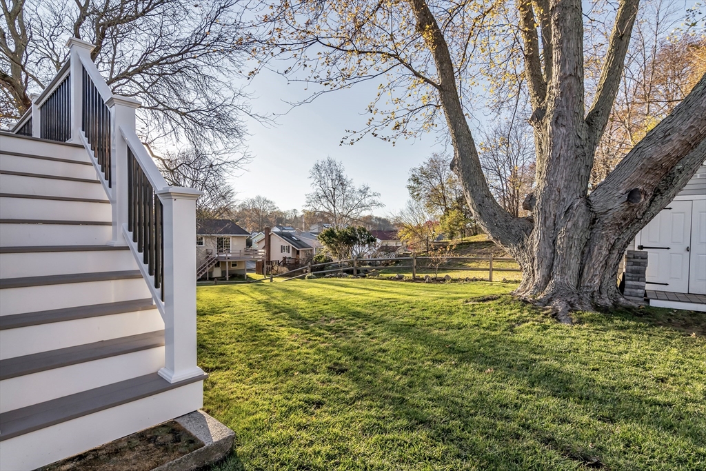 36 Summit Street Salem, MA 01970 - Photo 26 of 42 a view of a yard with small trees