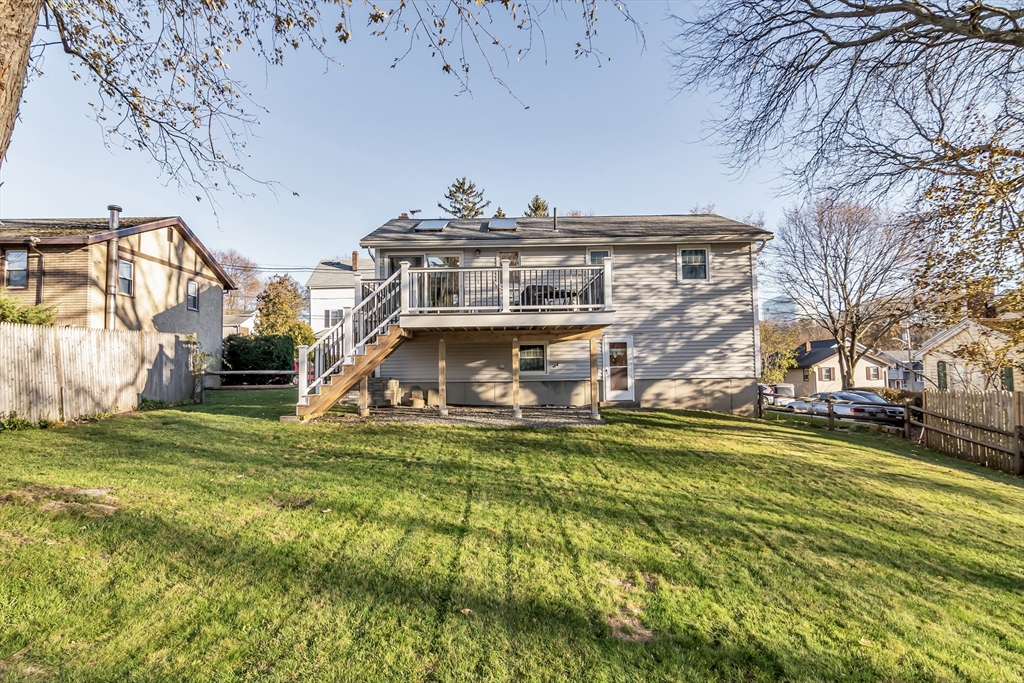 36 Summit Street Salem, MA 01970 - Photo 28 of 42 a view of a big house with a big yard and large trees