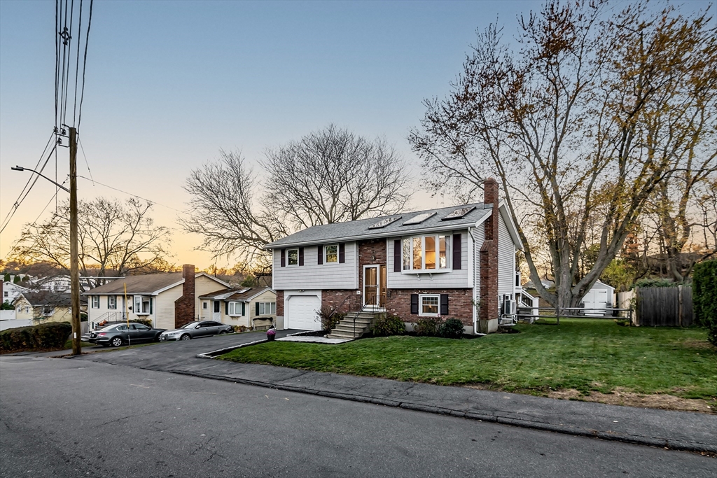 36 Summit Street Salem, MA 01970 - Photo 32 of 42 a view of a house with a yard and large tree
