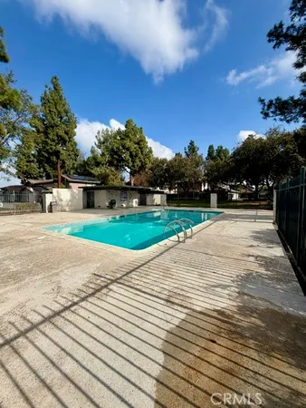 a view of outdoor space with swimming pool