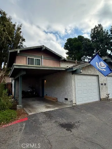 a house view with a outdoor space