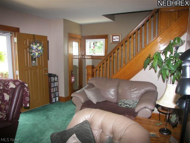 118 Canton Road Akron, OH 44312 - Photo 10 of 24 Another view of living room & stair case to 2nd level