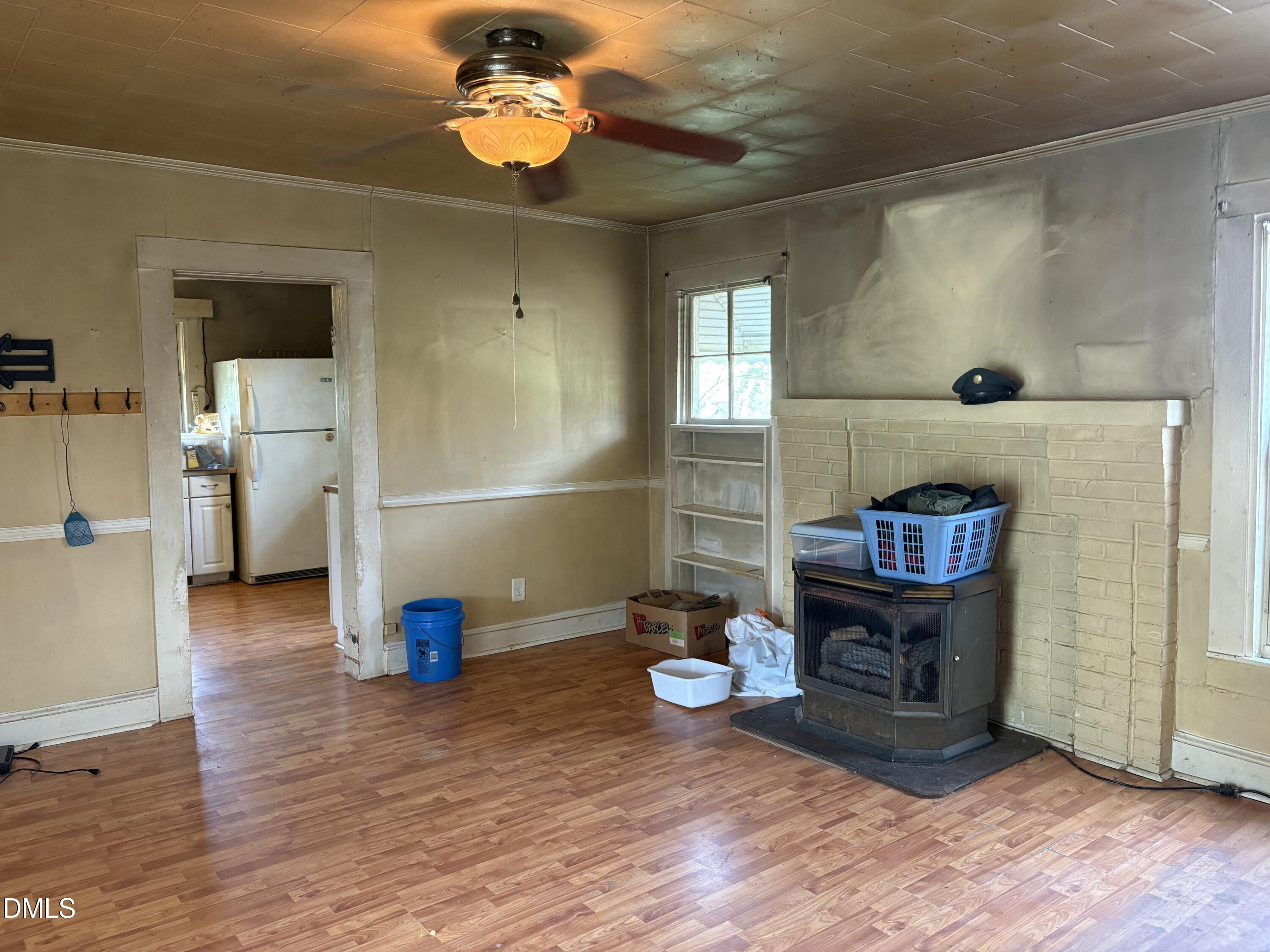1204 Winfred Brady Road Bennett, NC 27208 - Photo 11 of 16 a view of livingroom with furniture and wooden floor