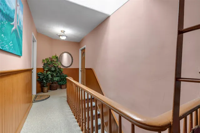 a view of a hallway with entryway