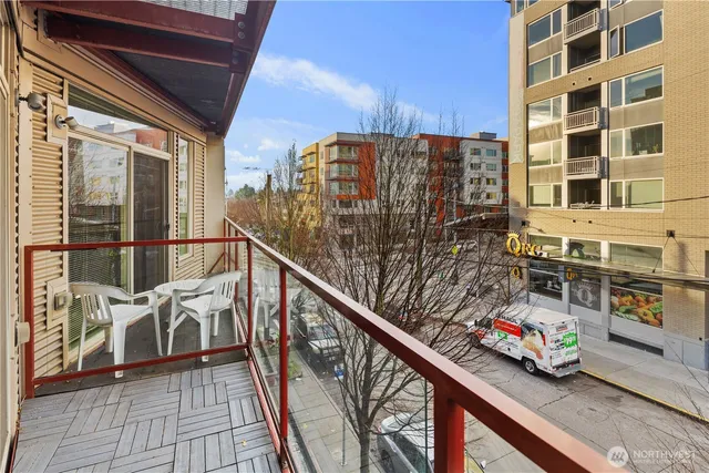 a view of balcony with a potted plant