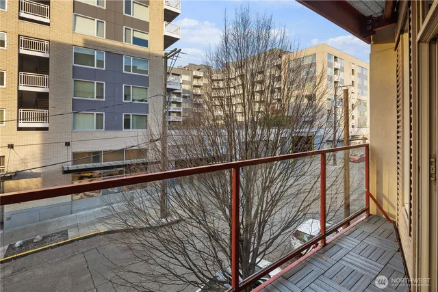 a living room with furniture a dining table and chairs