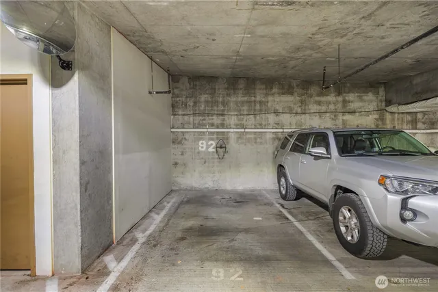 an aerial view of residential building with parking space