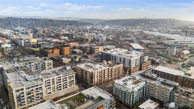 an aerial view of a city with lots of residential buildings