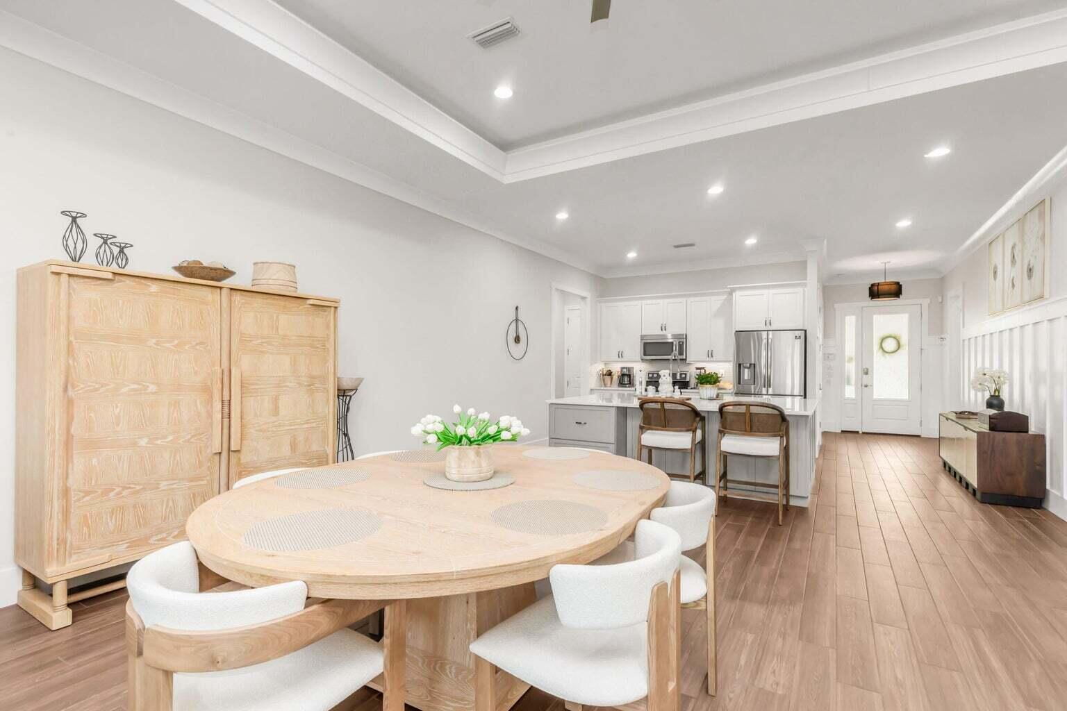 82 Amadeus Avenue Freeport, FL 32439 - Photo 16 of 95 a large kitchen with a table and chairs