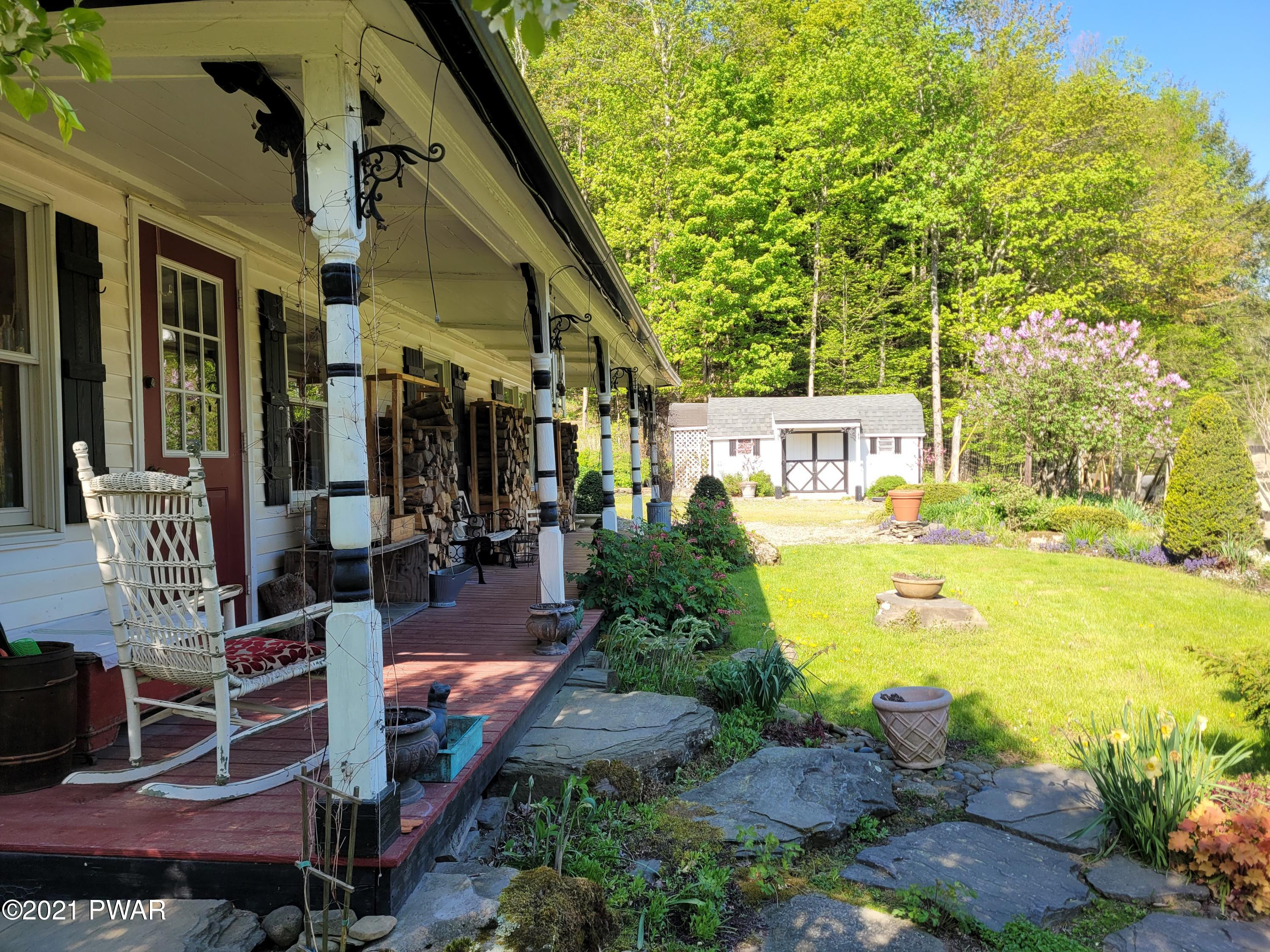 424 Teeple Road Equinunk, PA 18417 - Photo 28 of 41 LARGE FRONT PORCH