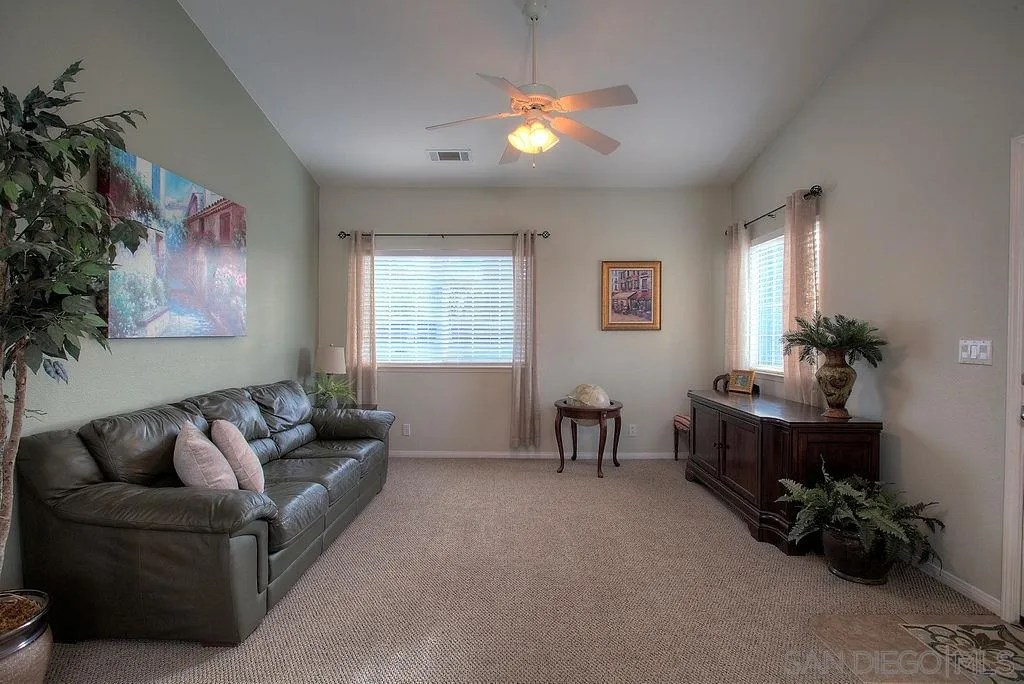 31028 Saddleback Road Valley Center, CA 92082 - Photo 12 of 21 a living room with furniture and a window