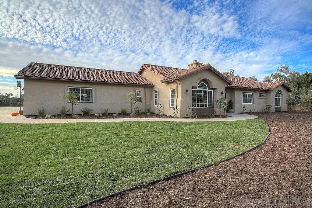 31028 Saddleback Road Valley Center, CA 92082 - Photo 21 of 21 a front view of a house with a garden
