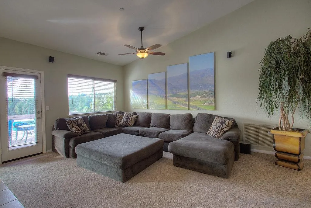 31028 Saddleback Road Valley Center, CA 92082 - Photo 5 of 21 a living room with furniture and a large window