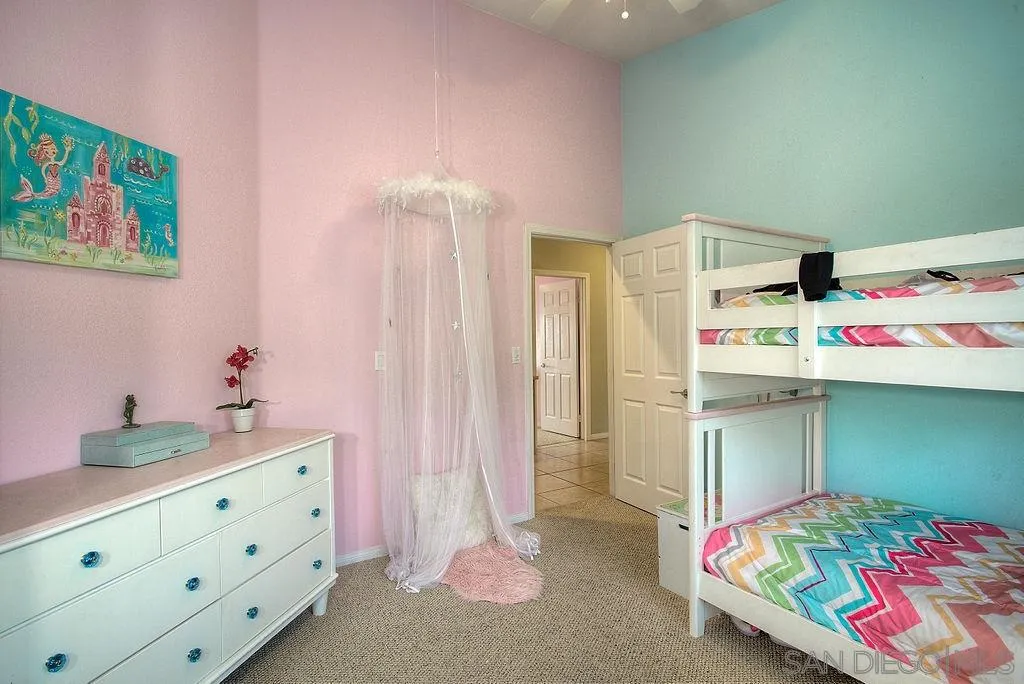 31028 Saddleback Road Valley Center, CA 92082 - Photo 6 of 21 a bedroom with a bed and a dresser in it