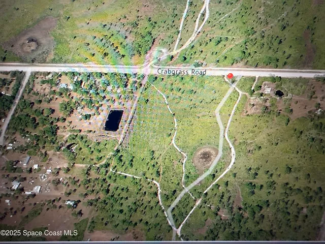 a white bath tub sitting next to a white wall