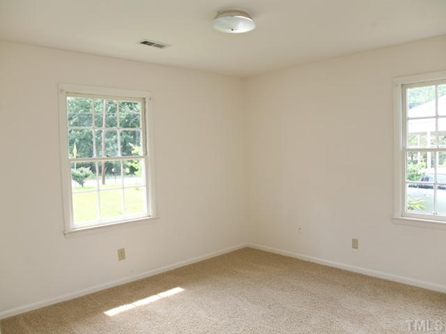 3704 Bland Road Raleigh, NC 27609 - Photo 9 of 16 an empty room with a window