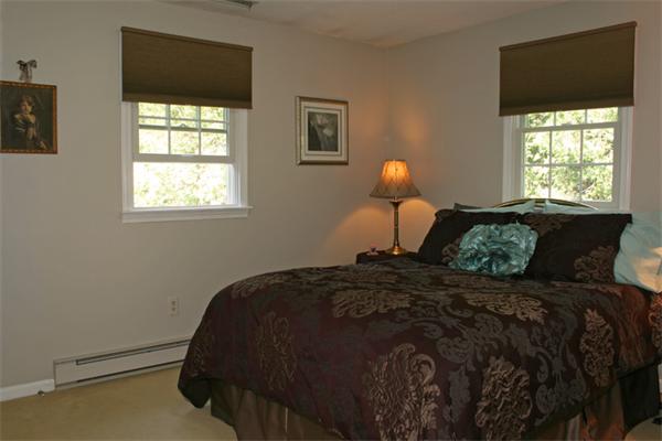 23 Peabody Road Shirley, MA 01464 - Photo 8 of 20 a bedroom with a bed and a window