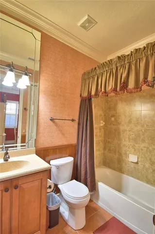 an aerial view of a house with a lake view and a ocean view