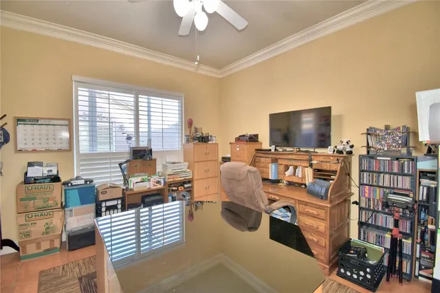 an aerial view of a house with a lake view