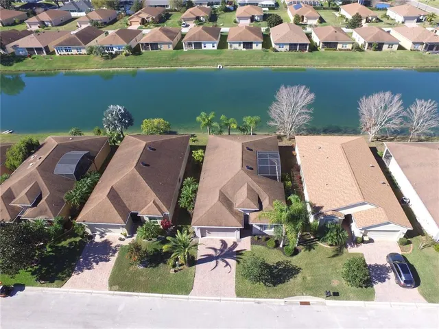a room with gym equipment and windows