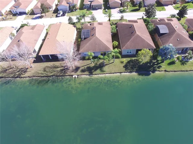 a view of a backyard of the house