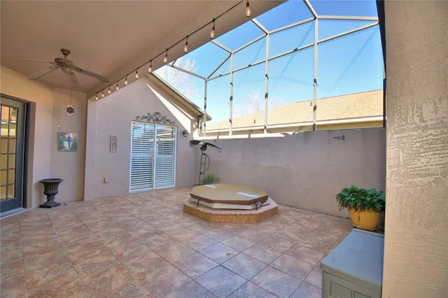 a kitchen with granite countertop a refrigerator stove and microwave