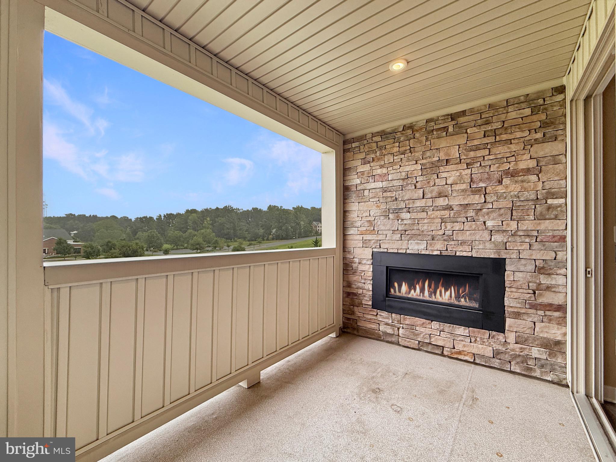 7820 Mine Run Road Hanover, MD 21076 - Photo 3 of 31 a view of a fireplace with a balcony