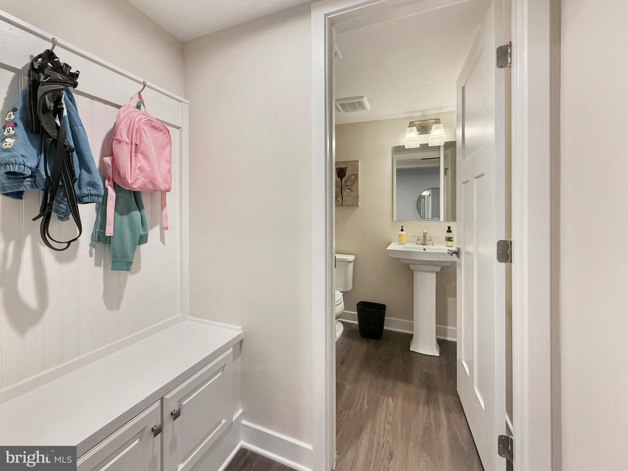 7820 Mine Run Road Hanover, MD 21076 - Photo 7 of 31 a bathroom with a sink and a mirror
