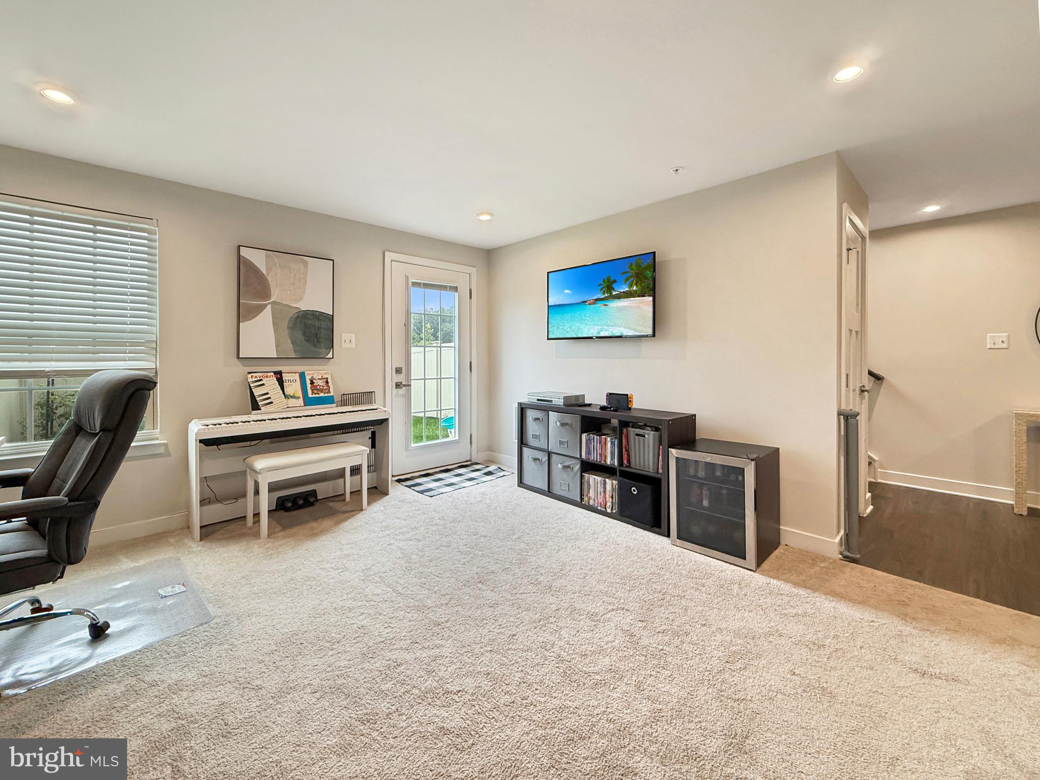 7820 Mine Run Road Hanover, MD 21076 - Photo 9 of 31 a bedroom with a bed and a desk in it