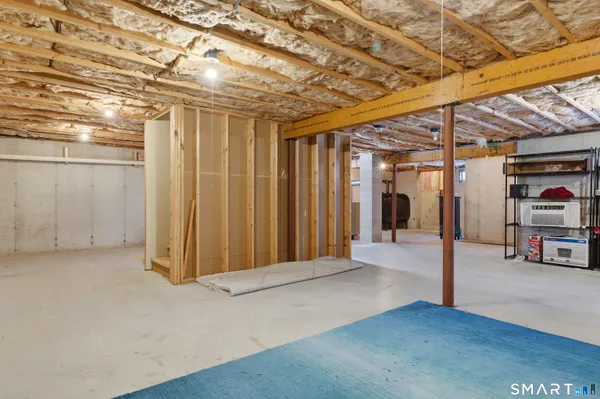 a view of a room with wooden walls