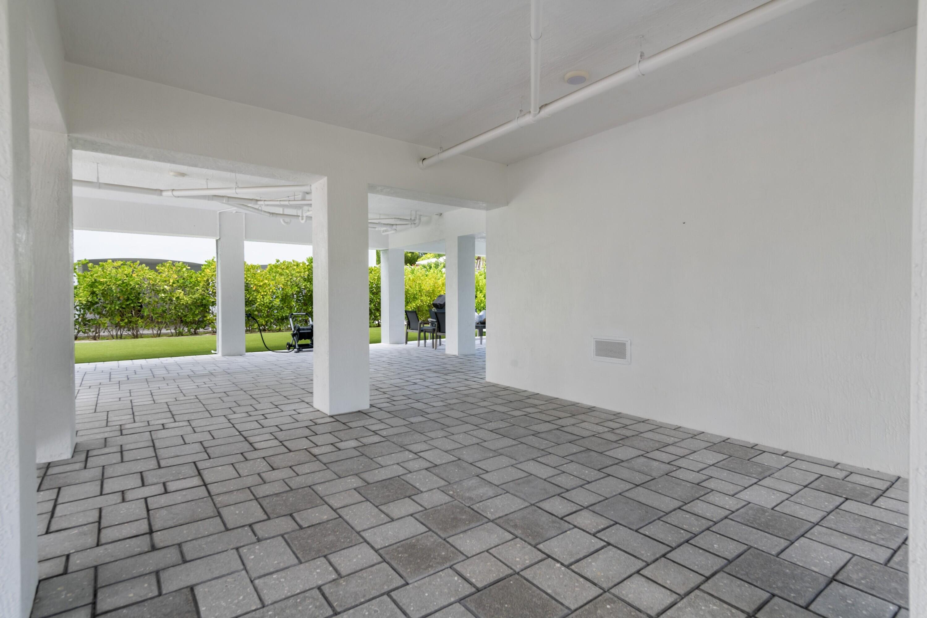 227 Corsair Road Marathon, FL 33050 - Photo 19 of 66 a view of an empty room and window