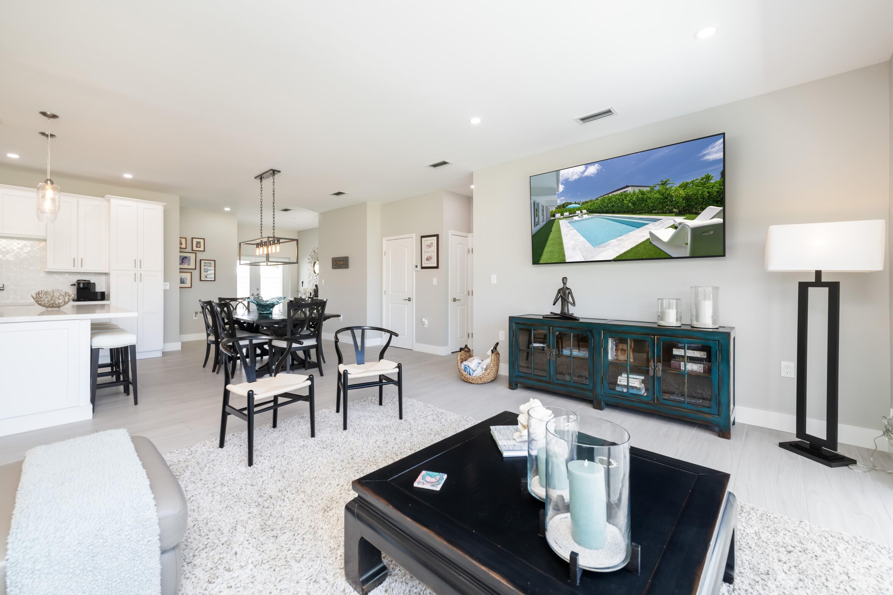 227 Corsair Road Marathon, FL 33050 - Photo 28 of 66 a living room with furniture and a fireplace