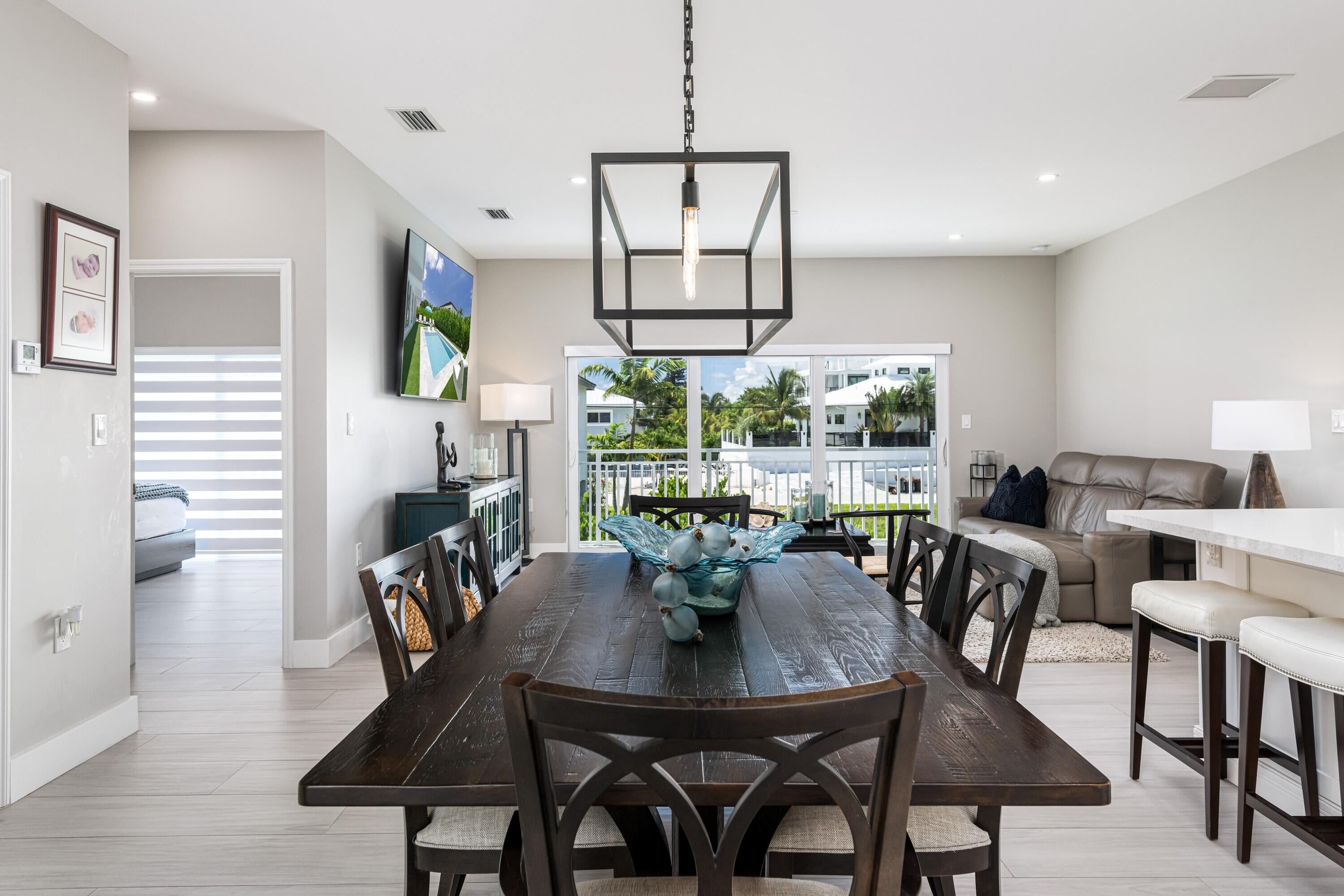 227 Corsair Road Marathon, FL 33050 - Photo 31 of 66 a view of a dining room with furniture window and outside view