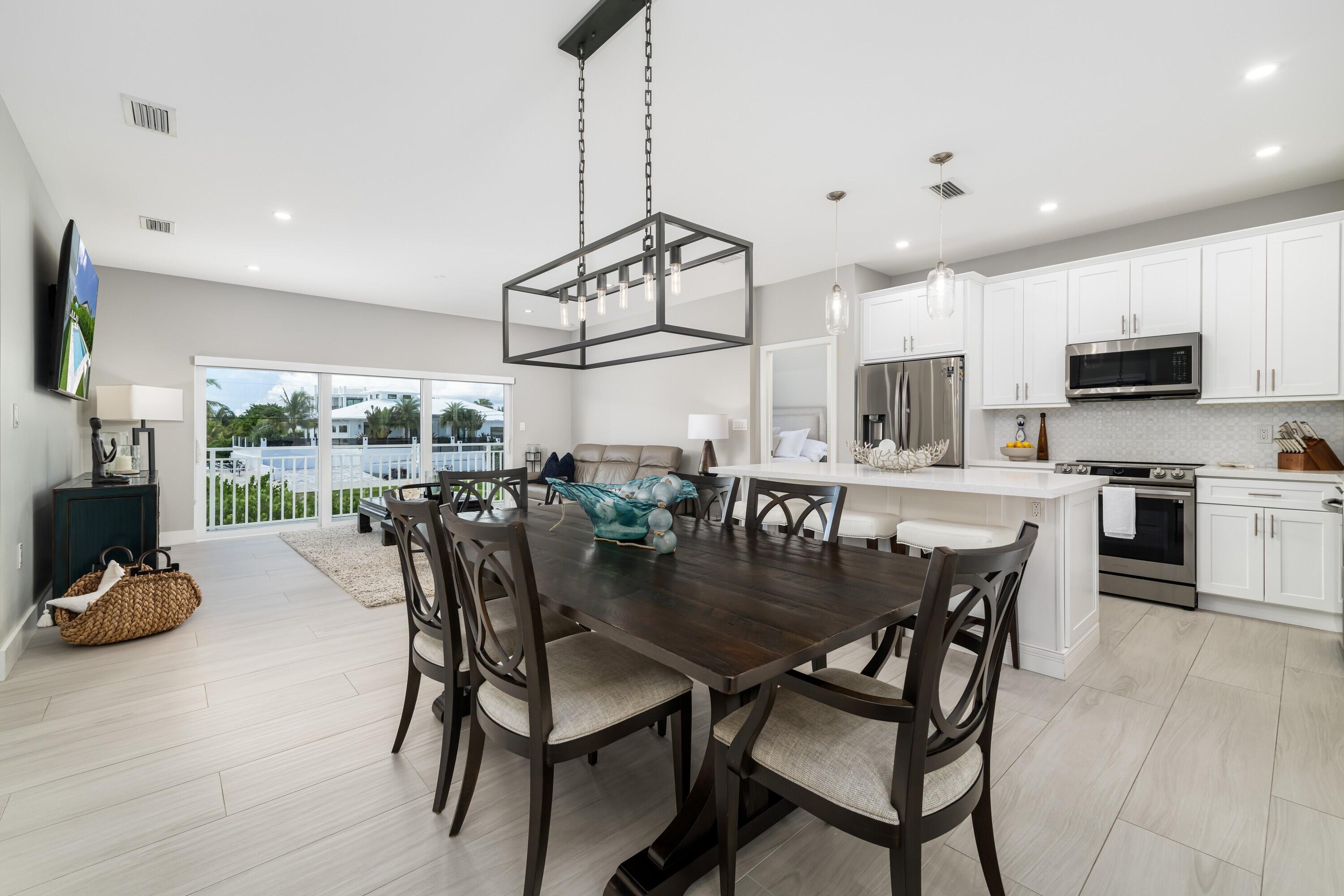 227 Corsair Road Marathon, FL 33050 - Photo 4 of 66 a view of a dining room and livingroom view
