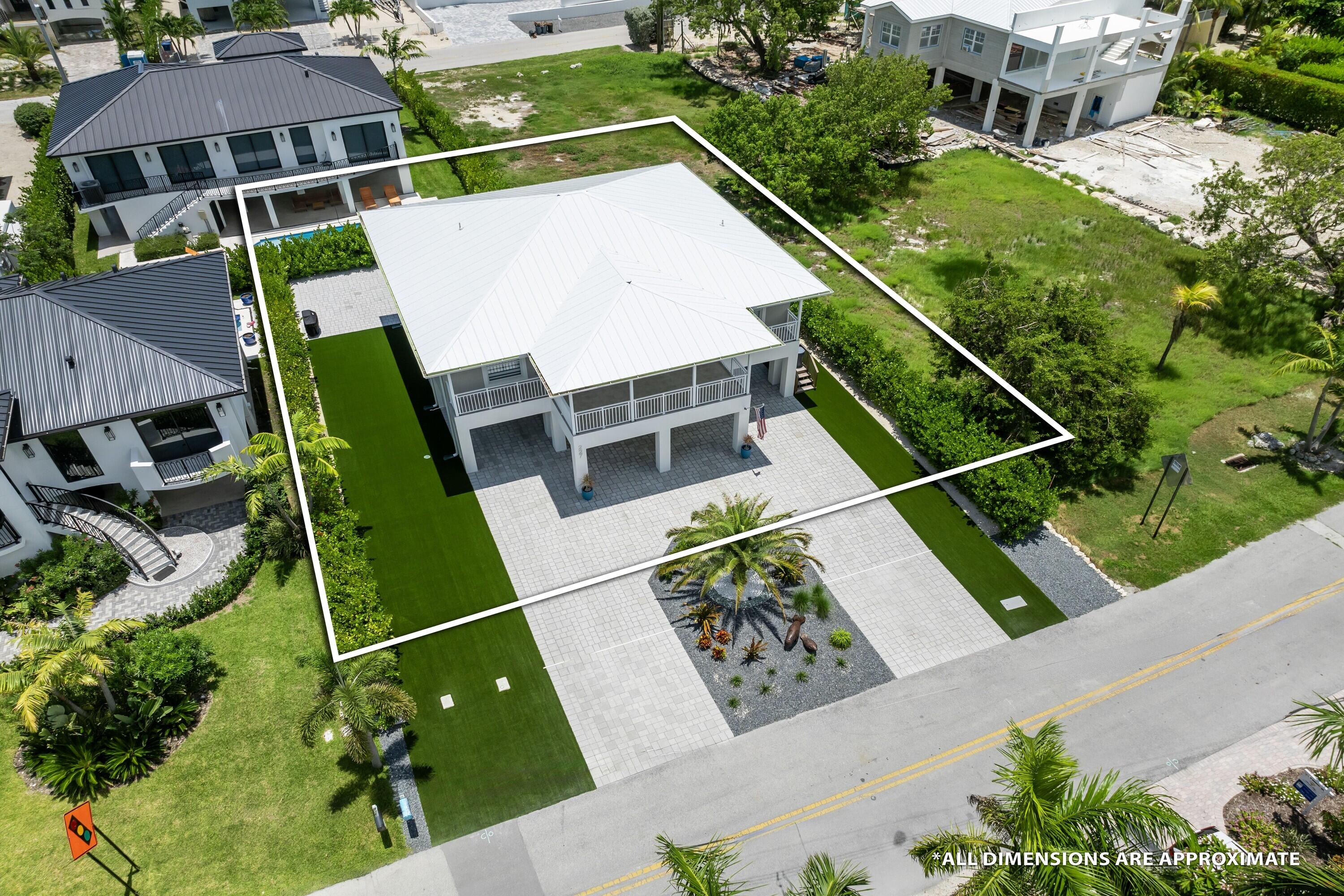 227 Corsair Road Marathon, FL 33050 - Photo 7 of 66 an aerial view of house with a swimming pool