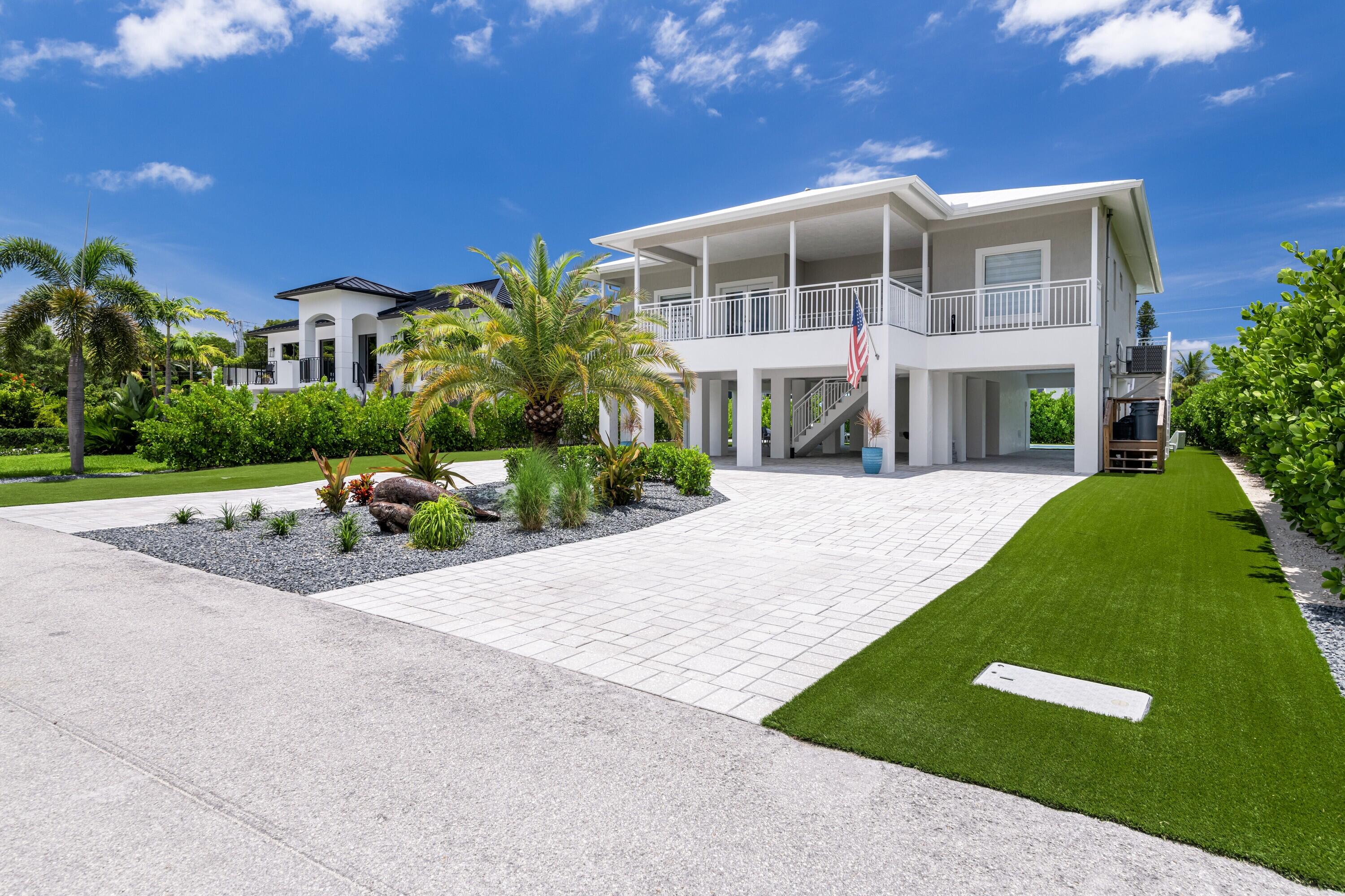 227 Corsair Road Marathon, FL 33050 - Photo 10 of 66 a front view of a house with a yard