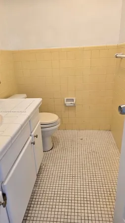 a bathroom with a sink and a toilet