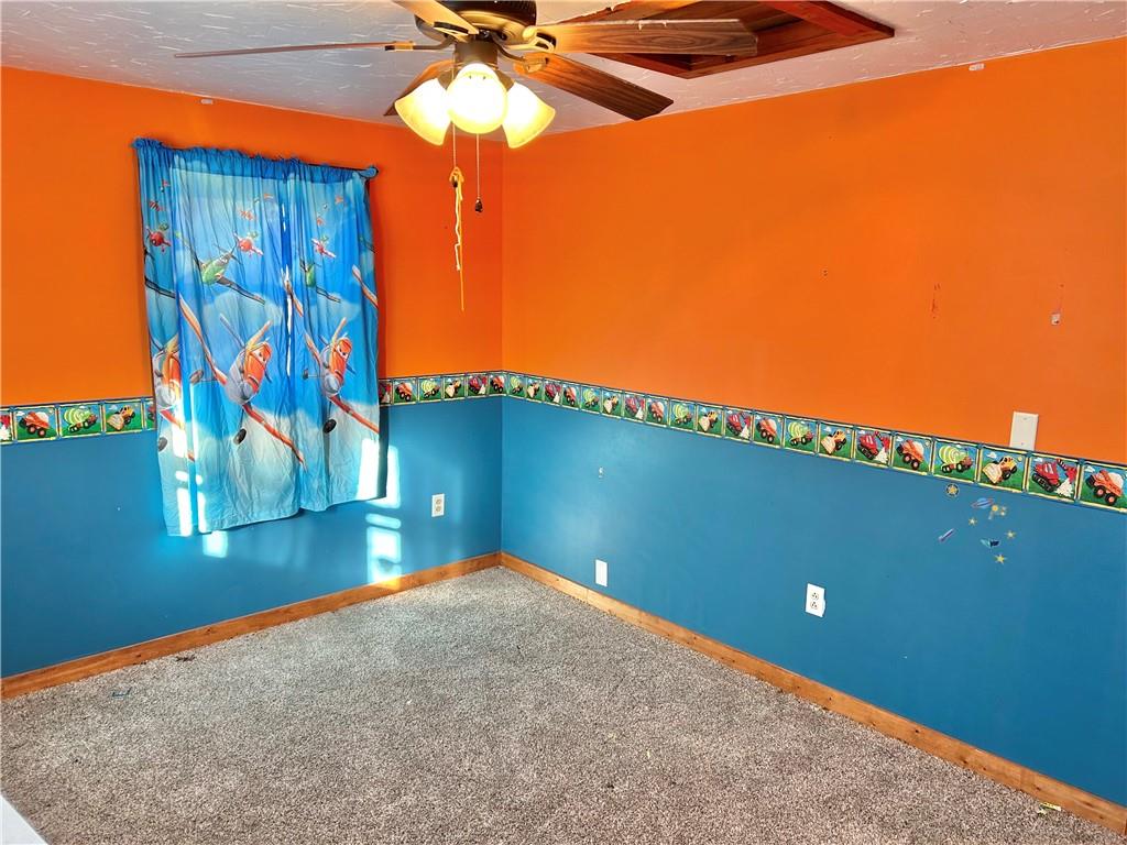 110 Horseshoe Bend Road Prosperity, PA 15329 - Photo 11 of 16 a view of a room with a ceiling fan and window