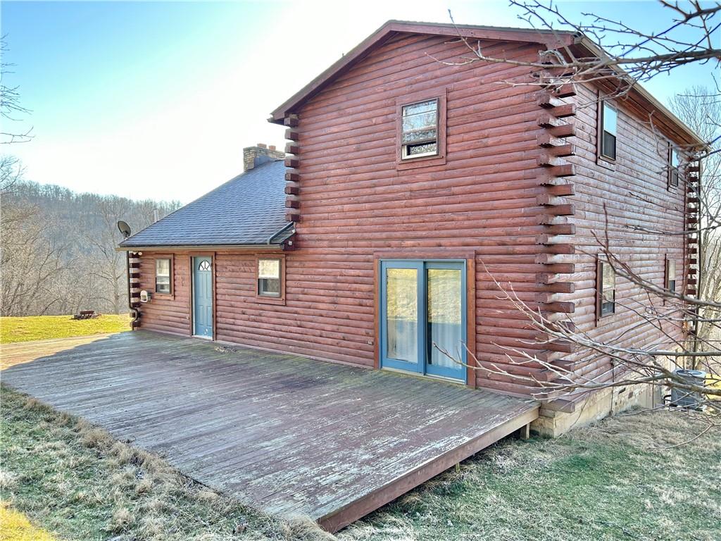 110 Horseshoe Bend Road Prosperity, PA 15329 - Photo 2 of 16 a view of a house with a yard and roof